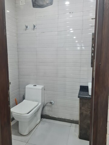 Bathroom in 1.5 BHK Builder Floor at Lajpat Nagar – for Rent