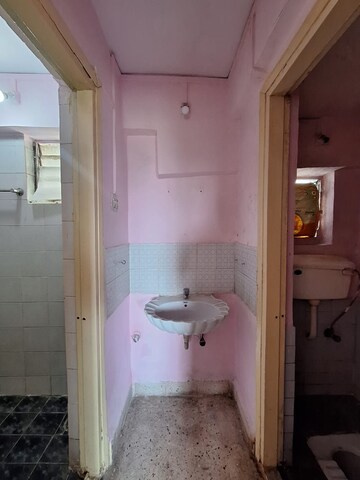 Bathroom in 1 BHK Apartment at Kanchan Janga CHS, Kopar Khairane – for Rent