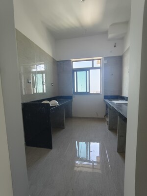 Kitchen in 3 BHK Apartment at Sheth Auris Serenity Tower 3, Malad West – for Rent