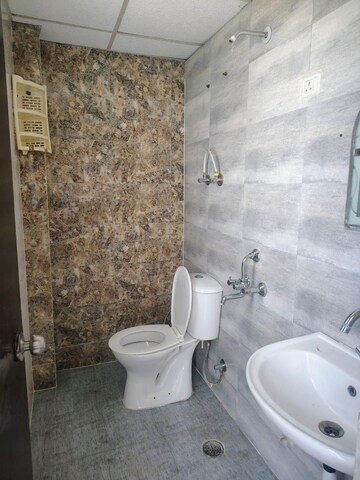 Bathroom in 2 BHK Apartment at SVP Gulmohur Garden, Raj Nagar Extension – for Sale