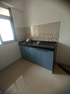 Kitchen in 2 BHK Apartment at Om Sai Plaza, Ghodbunder Road – for Rent