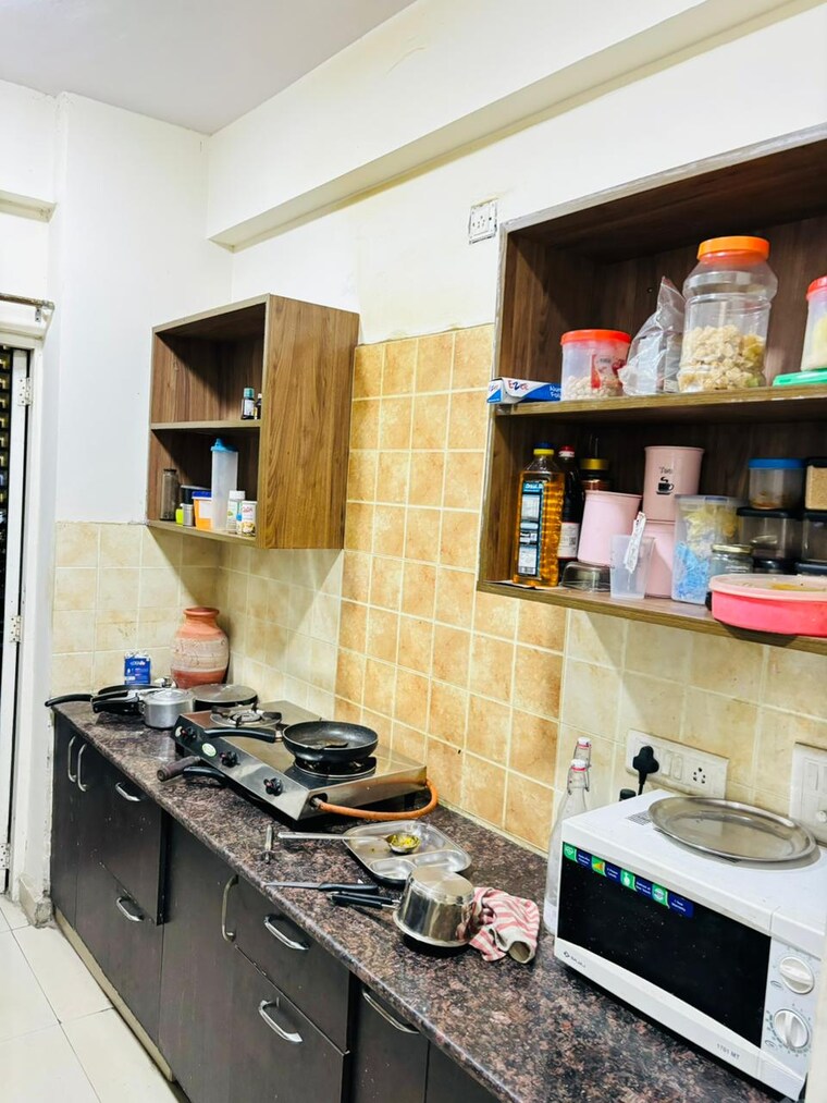 Kitchen, aims-golf-city 3.5 Bedroom 1550 Sq.Ft. Apartment In Sector 75 Noida 9288724