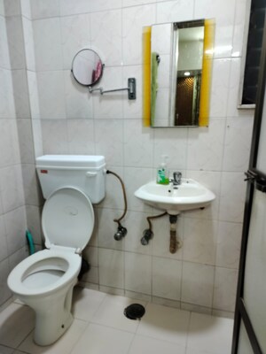 Bathroom in 2 BHK Apartment at Manibhadra CHS, Kopar Khairane – for Rent