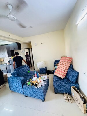 Living Room in 3.5 BHK Apartment at Aims Golf City, Sector 75 – for Rent