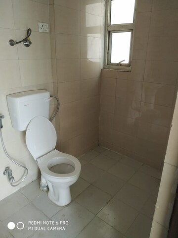 Bathroom in 3 BHK Apartment at Panchsheel Greens, Sector 16 Greater Noida – for Rent