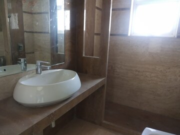 Bathroom in 3 BHK Apartment at Transcon Flora Heights, Andheri West – for Rent