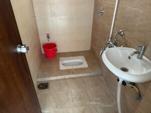 Bathroom in 2 BHK Apartment at Anand Silver Oak, Ravet – for Rent