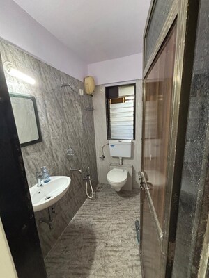 Bathroom in 1 BHK Apartment at Balaji Summer Set, Kandivali West – for Rent