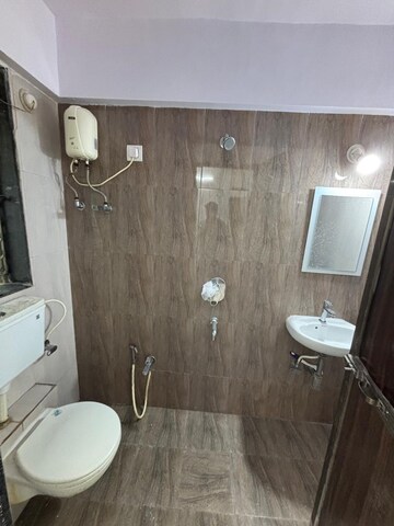 Bathroom in 1 BHK Apartment at Balaji Summer Set, Kandivali West – for Rent