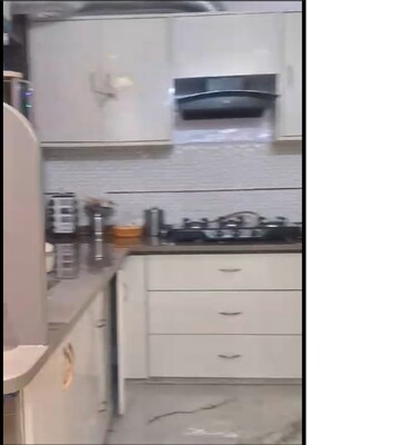 Kitchen in 4 BHK Builder Floor at Mansarover Garden – for Sale