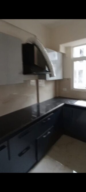 Kitchen in 2 BHK Apartment at Shree Vardhman Green Court, Sector 90 – for Rent