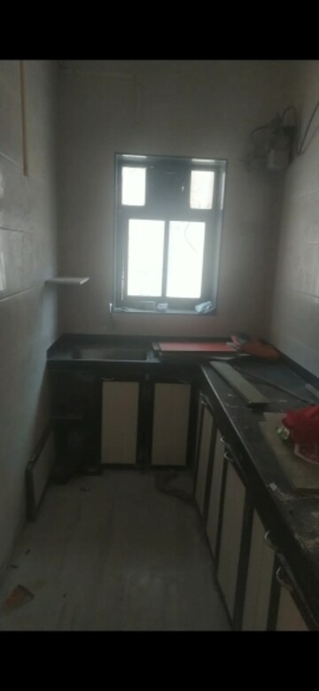 Kitchen in 2 BHK Apartment at Adarsh Nagar Society, Worli – for Rent