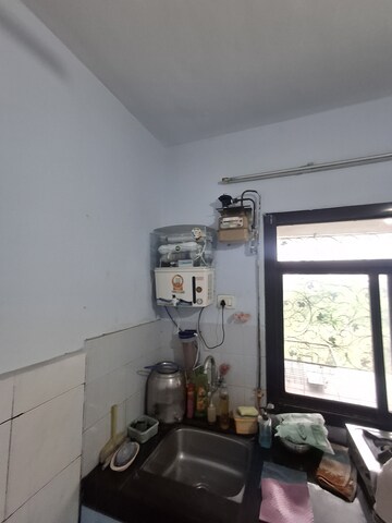 Living Room in 1 BHK Apartment at Eden Garden CHS, Viman Nagar – for Rent