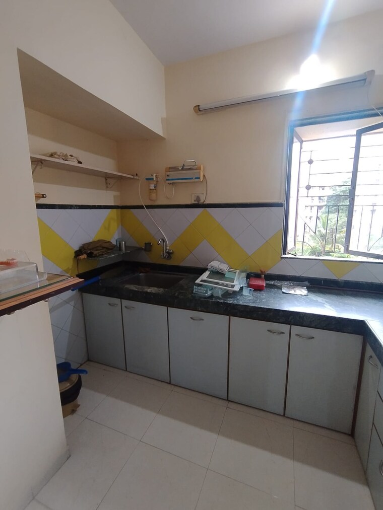 Kitchen, garden-court 1 Bedroom 449 Sq.Ft. Apartment In Waghbil Thane 9289681