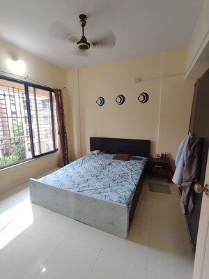 Bedroom in 1 BHK Apartment at Garden Court, Waghbil – for Rent