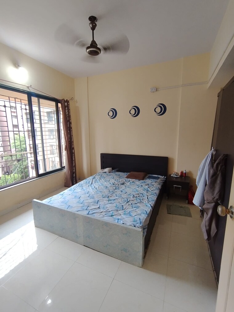 Bedroom, garden-court 1 Bedroom 449 Sq.Ft. Apartment In Waghbil Thane 9289681