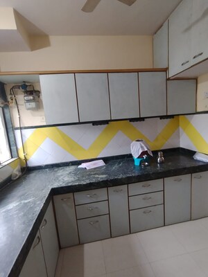 Kitchen in 1 BHK Apartment at Garden Court, Waghbil – for Rent