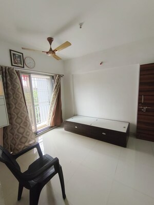 Living Room in 1 BHK Apartment at Shree Vaishnavi Heights, Owale – for Rent