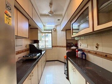 Kitchen in 2.5 BHK Apartment at Manish Rose, Andheri West – for Rent