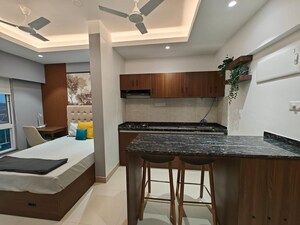 Kitchen in Studio Apartment at Gera World of Joy, Kharadi – for Rent