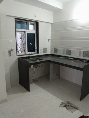 Kitchen in 2 BHK Apartment at Samet Sikar Mahal, Borivali East – for Sale