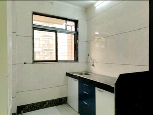 Kitchen in 1 BHK Apartment at Maya Harmony, Mulund West – for Sale