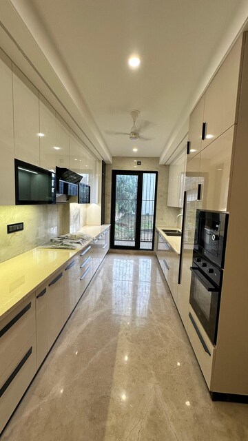 Kitchen in 3 BHK Builder Floor at Ansal API Esencia, Sector 67 – for Rent
