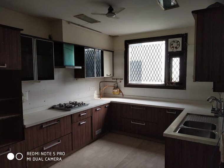 Kitchen, lajpat nagar ii 4 Bedroom 333 Sq.Yd. Builder Floor In Lajpat Nagar ii Delhi 9290386