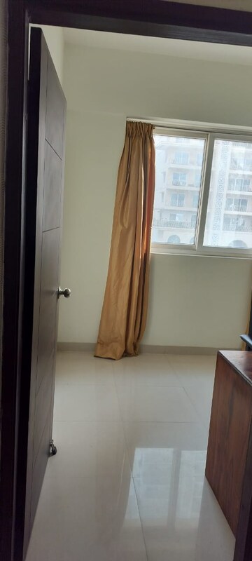 Building Lobby in 2 BHK Apartment at Mahagun Mirabella Highrise, Sector 79 – for Rent