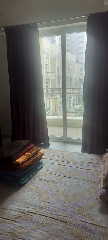 Bedroom in 2 BHK Apartment at Mahagun Mirabella Highrise, Sector 79 – for Rent