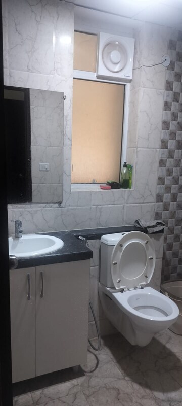 Bathroom in 2 BHK Apartment at Mahagun Mirabella Highrise, Sector 79 – for Rent