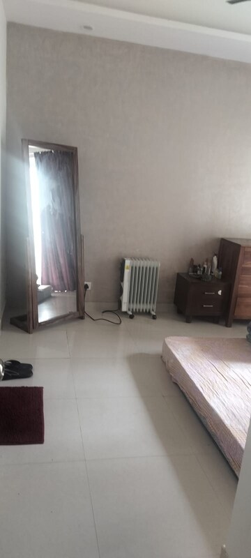 Living Room in 2 BHK Apartment at Mahagun Mirabella Highrise, Sector 79 – for Rent