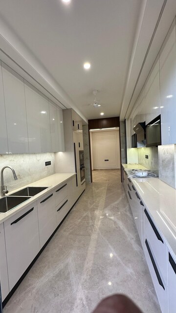 Kitchen in 4 BHK Builder Floor at Ansal API Esencia, Sector 67 – for Rent