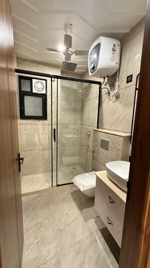 Bathroom in 4 BHK Builder Floor at Ansal API Esencia, Sector 67 – for Rent