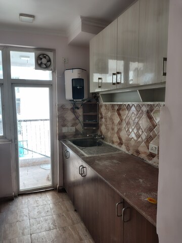 Kitchen in 3 BHK Apartment at Amrapali Leisure Park, Amrapali Leisure Valley – for Rent
