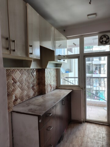 Kitchen in 3 BHK Apartment at Amrapali Leisure Park, Amrapali Leisure Valley – for Rent