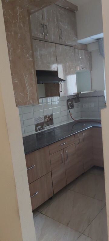 Kitchen in 2 BHK Apartment at Gaur City 2 - 14th Avenue, Sector 16c Greater Noida – for Rent