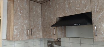 Kitchen in 2 BHK Apartment at Gaur City 2 - 14th Avenue, Sector 16c Greater Noida – for Rent