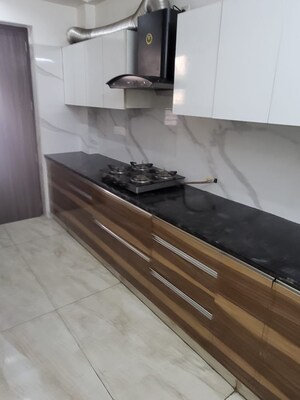 Kitchen in 3 BHK Builder Floor at Ansal API Esencia, Sector 67 – for Rent