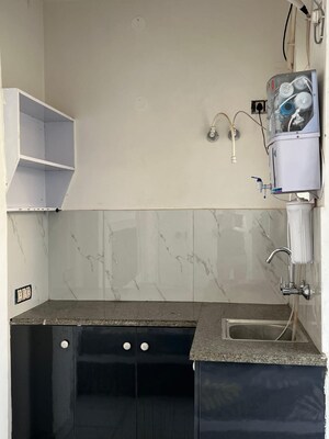 Kitchen in 1 RK Apartment at Vipul World Floors, Sector 48 – for Rent