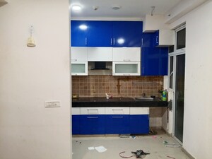 Kitchen in 3 BHK Apartment at Mahagun Mywoods, Sector 16c Greater Noida – for Rent