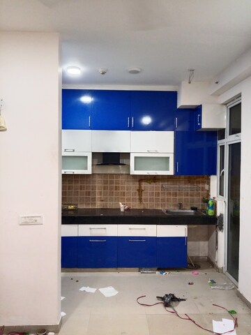 Kitchen in 3 BHK Apartment at Mahagun Mywoods, Sector 16c Greater Noida – for Rent