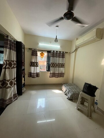 Living Room in 1 BHK Apartment at Vrindavan CHS Worli, Worli – for Rent