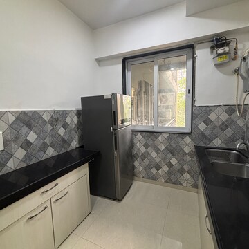 Kitchen in 3 BHK Apartment at Jainam Elysium, Kukreja – for Rent