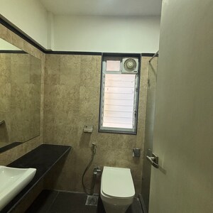 Bathroom in 3 BHK Apartment at Jainam Elysium, Kukreja – for Rent