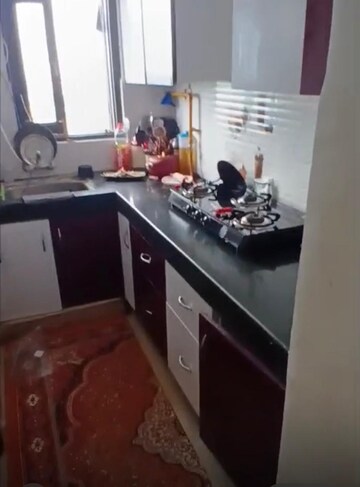 Kitchen in 1.5 BHK Apartment at Techman Moti Residency, Raj Nagar Extension – for Sale