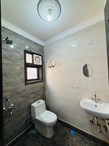 Bathroom in 2 BHK Builder Floor at Chattarpur – for Rent
