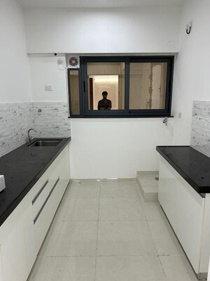 Kitchen in 2 BHK Apartment at Amanora Gold Towers, Hadapsar – for Rent