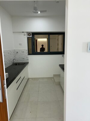 Kitchen in 2 BHK Apartment at Amanora Gold Towers, Hadapsar – for Rent