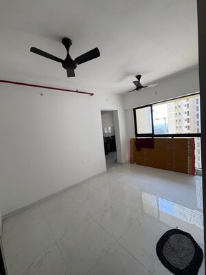 Living Room in 1 BHK Apartment at Runwal Gardens Phase 2, Dombivli East – for Rent